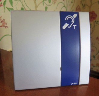 A portable Sarabec LA-90 Hearing loop is kept in the house dining room